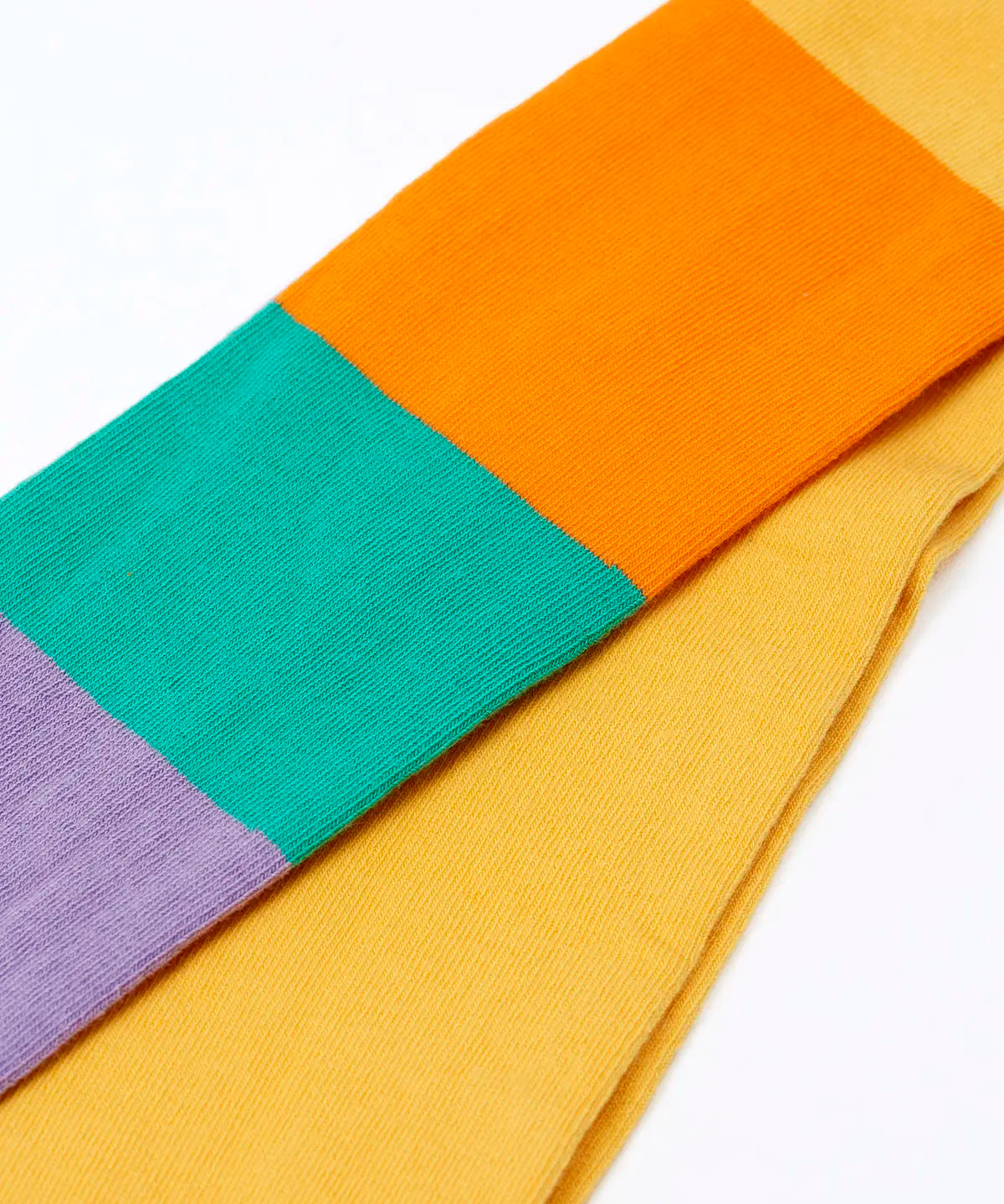 Frugi GOTS 100% organic cotton 2 pack tights showing a close up of the pastel rainbow striped design