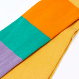 Frugi GOTS 100% organic cotton 2 pack tights showing a close up of the pastel rainbow striped design