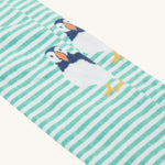 A look at the white and moss green stripes, with puffin knee print on the Frugi Norah Tights - Moss/Puffin