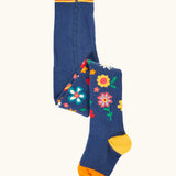 Frugi GOTS 100% organic cotton kids tights in navy with a floral resign on the lower leg, orange toe and yellow heel panel