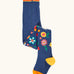 Frugi GOTS 100% organic cotton kids tights in navy with a floral resign on the lower leg, orange toe and yellow heel panel