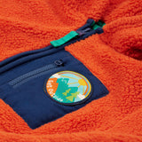 A closer look at the chest pocket and Get Outside patch