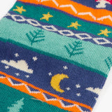 Frugi GOTS organic knitted footless leggings showing close up of festive fair isle design on the leg