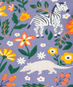 A closer look at the print on the Frugi Libby Printed Leggings - Rainforest Friends,with zebras, flamingos, parrots, and more wild friends print.