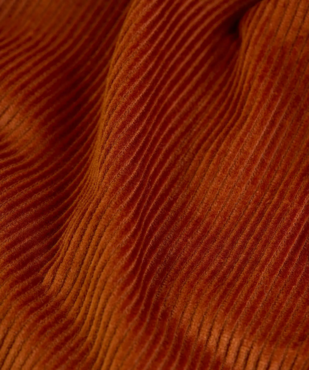 Frugi GOTS organic cotton children's trousers in rust brown showing the corduroy detail