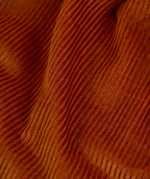 Frugi GOTS organic cotton children's trousers in rust brown showing the corduroy detail
