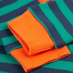 A look at the orange wrist cuffs on the Frugi Rowan Romper - Iguana Stripe/Tiger