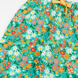 Frugi GOTS 100% organic cotton snuggle joggers in light green with a floral design and a elasticated waistband with drawcord