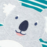Frugi kids long sleeve top showing a close up of the playful koala applique on blue and white striped organic cotton fabric