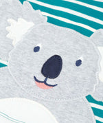 Frugi kids long sleeve top showing a close up of the playful koala applique on blue and white striped organic cotton fabric