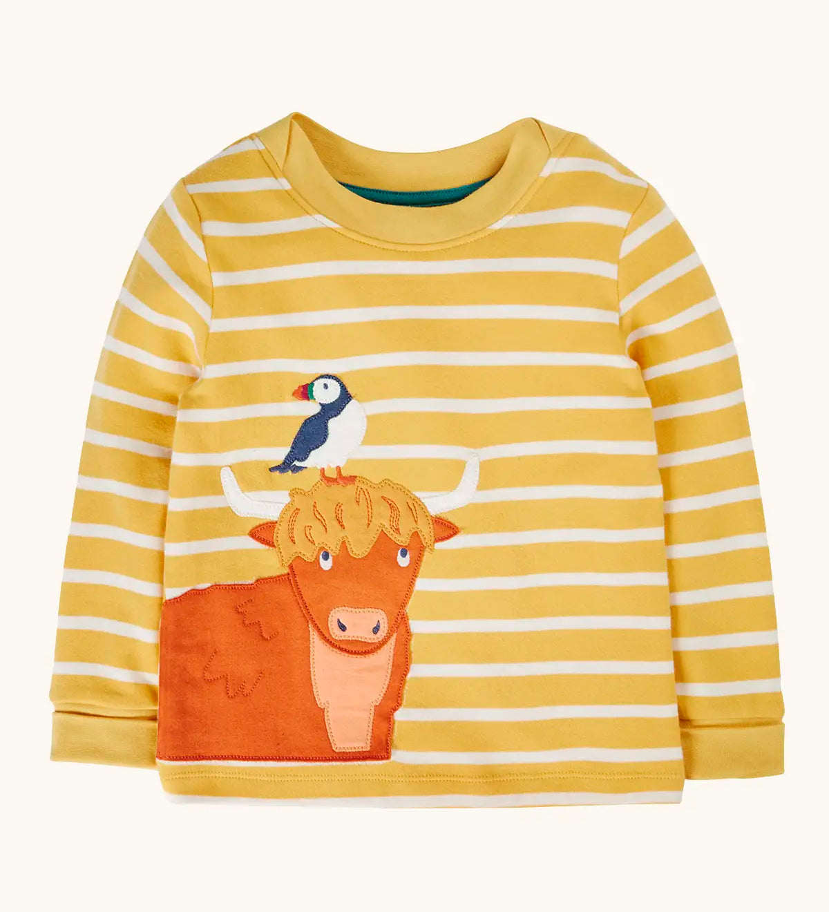 Frugi GOTS 100% organic cotton kids long sleeve top in yellow and white stripes with a highland cow and puffin applique on the bottom