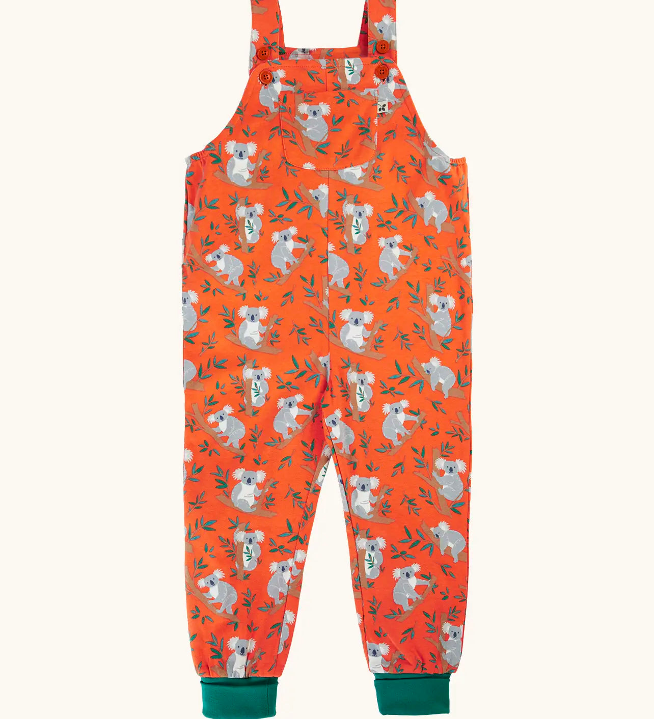 Frugi parsnip GOTS organic cotton dungaree in salamander orange with repeating koala prints, turquoise fold up leg cuffs and a pouch pocket