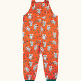 Frugi parsnip GOTS organic cotton dungaree in salamander orange with repeating koala prints, turquoise fold up leg cuffs and a pouch pocket