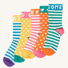 Frugi kids sunnie multipack socks  available at Babipur. 100% GOTS organic cotton socks in bright and fun striped and polka dot designs. Features soft elasticated ankle cuffs with slogans, bees and flowers