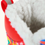 Frugi out and about snow boots in fun frenzy showing a close up of the fleece inner lining 