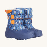 Frugi out and about snow boots in penguin waddle available at Babipur. A blue winters boot with orange trim and a penguin print. Features a fleece inner and velcro fasteners. 