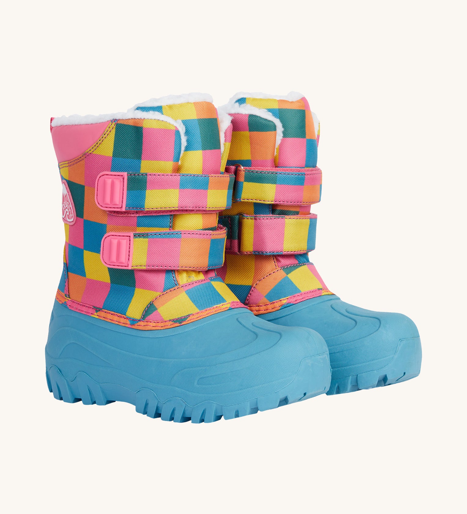 Frugi out and about snow boots in rainbow check waddle available at Babipur. A bright checked winters boot with pink trim and a light blue deep sole. Features a white fleece inner and velcro fasteners. 