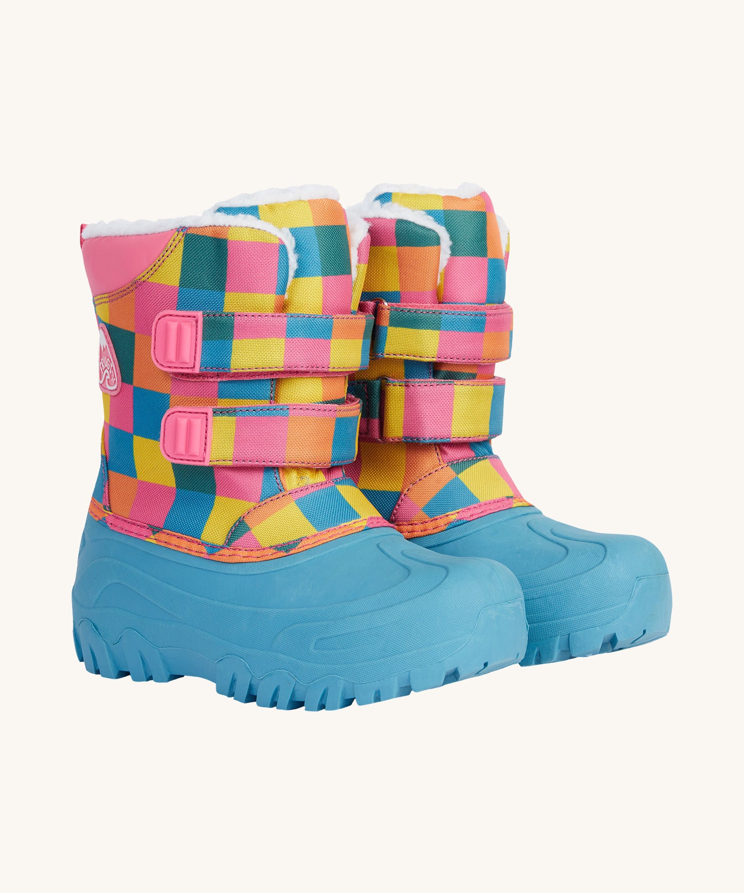 Frugi out and about snow boots in rainbow check waddle available at Babipur. A bright checked winters boot with pink trim and a light blue deep sole. Features a white fleece inner and velcro fasteners. 