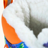 Frugi out and about snow boots in starry slopes showing close up of the fleece inner lining
