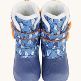 A close up of the Frugi out and about snow boots in penguin waddle showing the blue toe protector cap and velcro fastener detail.