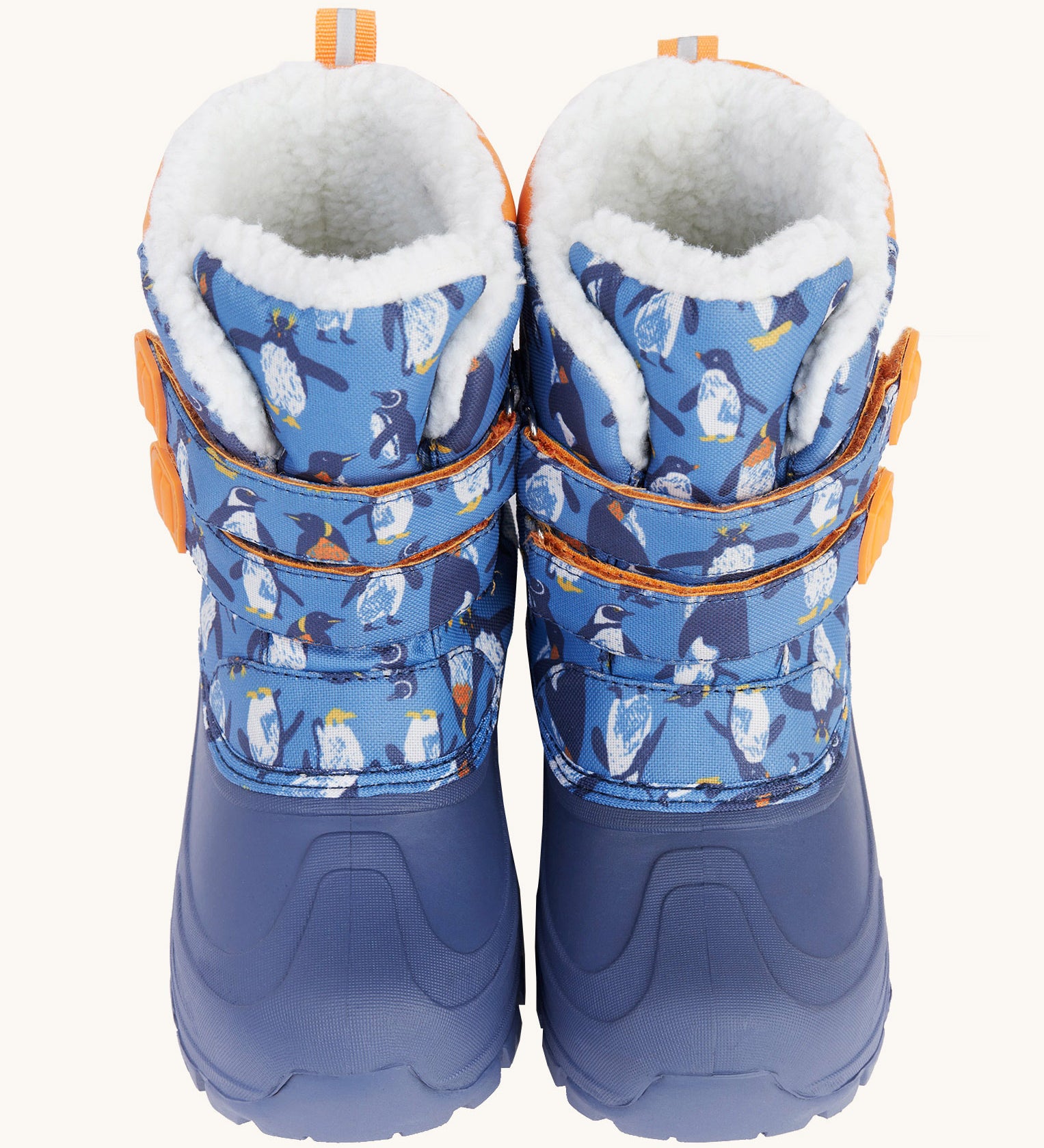 A close up of the Frugi out and about snow boots in penguin waddle showing the blue toe protector cap and velcro fastener detail.