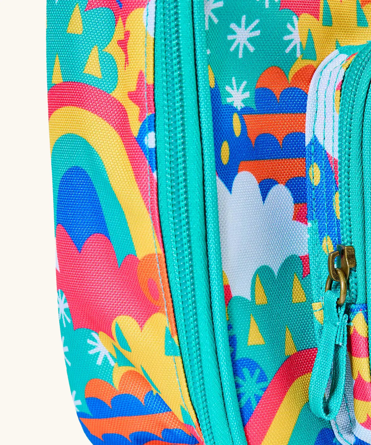 Frugi fun frenzy pack a lunch bag showing a close up of the repeating multicoloured abstract cloud design and aqua trim