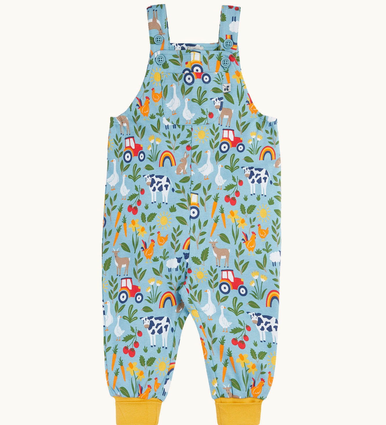 Frugi organic cotton dungarees. In a light blue and yellow trim with a  repeated farm theme print. Features button fasteners and a small pocket on the front