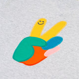 A closer look at the peace applique on the front of the Frugi Owen Top - Grey Marl/Peace
