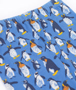 A close up of the Frugi organic cotton kids libby leggings showing the penguin print and elasticated waist band. Leggings are available at Babipur
