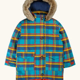 Frugi Penhale parka coat in a blue, yellow and red tartan design. Features side pockets, full length button fasteners, fleece inner and a furry hood