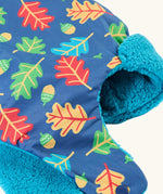 Frugi kids navy playtime trapper hat laid flat showing the repeating leaf and acorn design and aqua fleece inner lining.