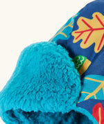 Frugi kids navy playtime trapper hat showing close up of the aqua fleece inner liner on the front flap