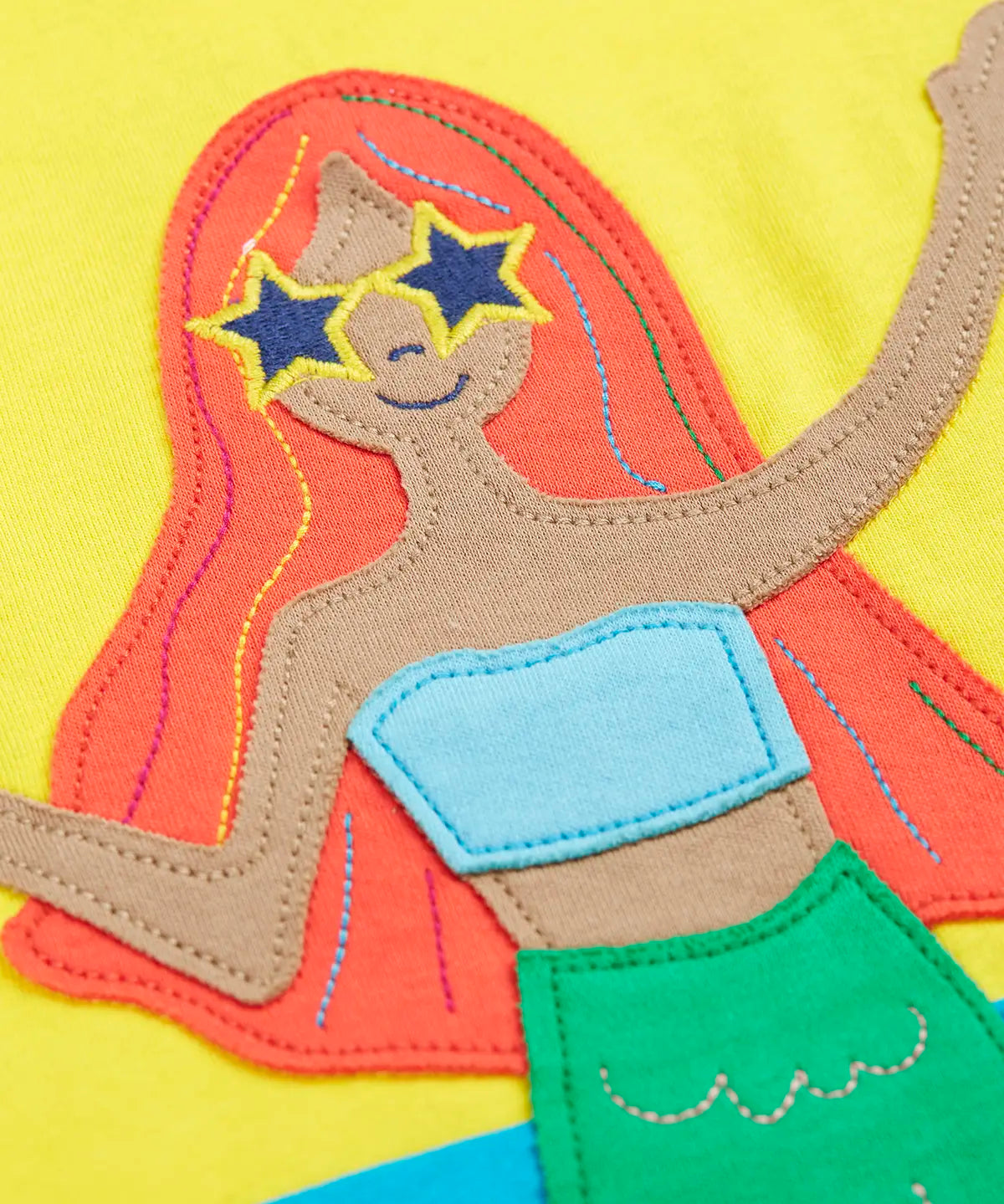 Frugi hotchpotch short sleeve t-shirt laid flat showing a mermaid patch 
