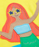 Frugi hotchpotch short sleeve t-shirt laid flat showing a mermaid patch 