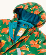 Frugi waterproof puddle buster coat in highland grazing laid flat showing the front zip with velcro fastener and blue fleece liner with name tag