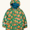 Frugi waterproof puddle buster coat in highland grazing. A green hooded coat with a repeating Highland cow design, side pockets and a blue fleece inner