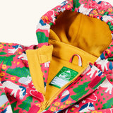 Frugi waterproof puddle buster coat in purrfect ponies laid flat showing the zip and velcro fastener and yellow fleece inner liner with name tag