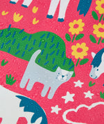 Frugi waterproof puddle buster coat in purrfect ponies showing the repeating cat and pony design and water beading