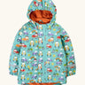 Frugi waterproof puddle buster coat in terrific tractors A aqua hooded coat with a repeating tractor design, side pockets and a orange fleece inner