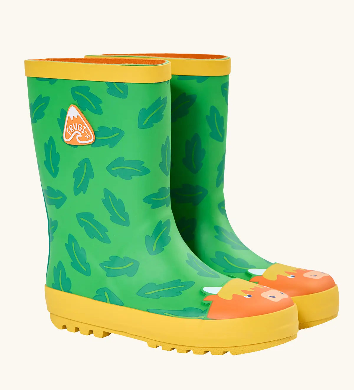 Frugi natural rubber, waterproof puddle buster wellingtons in green with a repeating leaf design and highland cow 