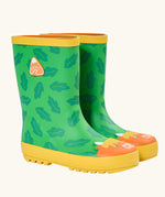 Frugi natural rubber, waterproof puddle buster wellingtons in green with a repeating leaf design and highland cow 
