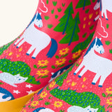 Frugi natural rubber, waterproof puddle buster wellingtons in purrfect ponies design showing water beading 