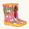 Frugi natural rubber, waterproof puddle buster wellingtons in pink with a repeating cat and pony design and yellow sole