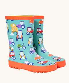 Frugi natural rubber, waterproof puddle buster wellingtons in aqua with a repeating tractor design and orange sole
