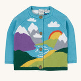 Frugi kid reva knitted cardigan in blue/mountain scene available at Babipur. A GOTS organic cotton soft knitted cardigan in light blue with a mountain scene . Features button fasteners
