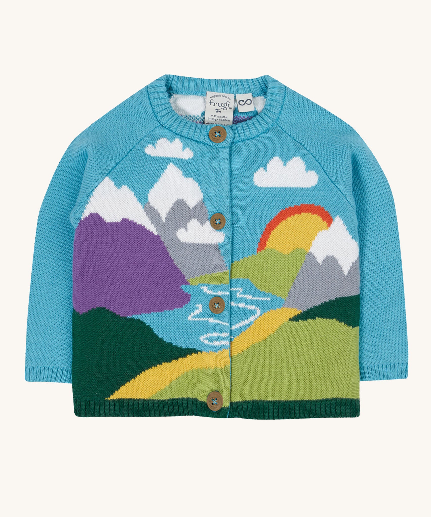 Frugi kid reva knitted cardigan in blue/mountain scene available at Babipur. A GOTS organic cotton soft knitted cardigan in light blue with a mountain scene . Features button fasteners