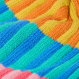 Frugi bobble hat showing close up of the rainbow stripe design on organic cotton fabric