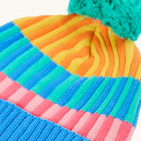 Frugi GOTS organic cotton bobble hat laid flat showing pastel rainbow stripe design
