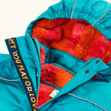 Frugi kids 3 in 1 rambler coat in boat blue/rhubarb check laid flat showing the pink and orange check fleece inner lining on the hood