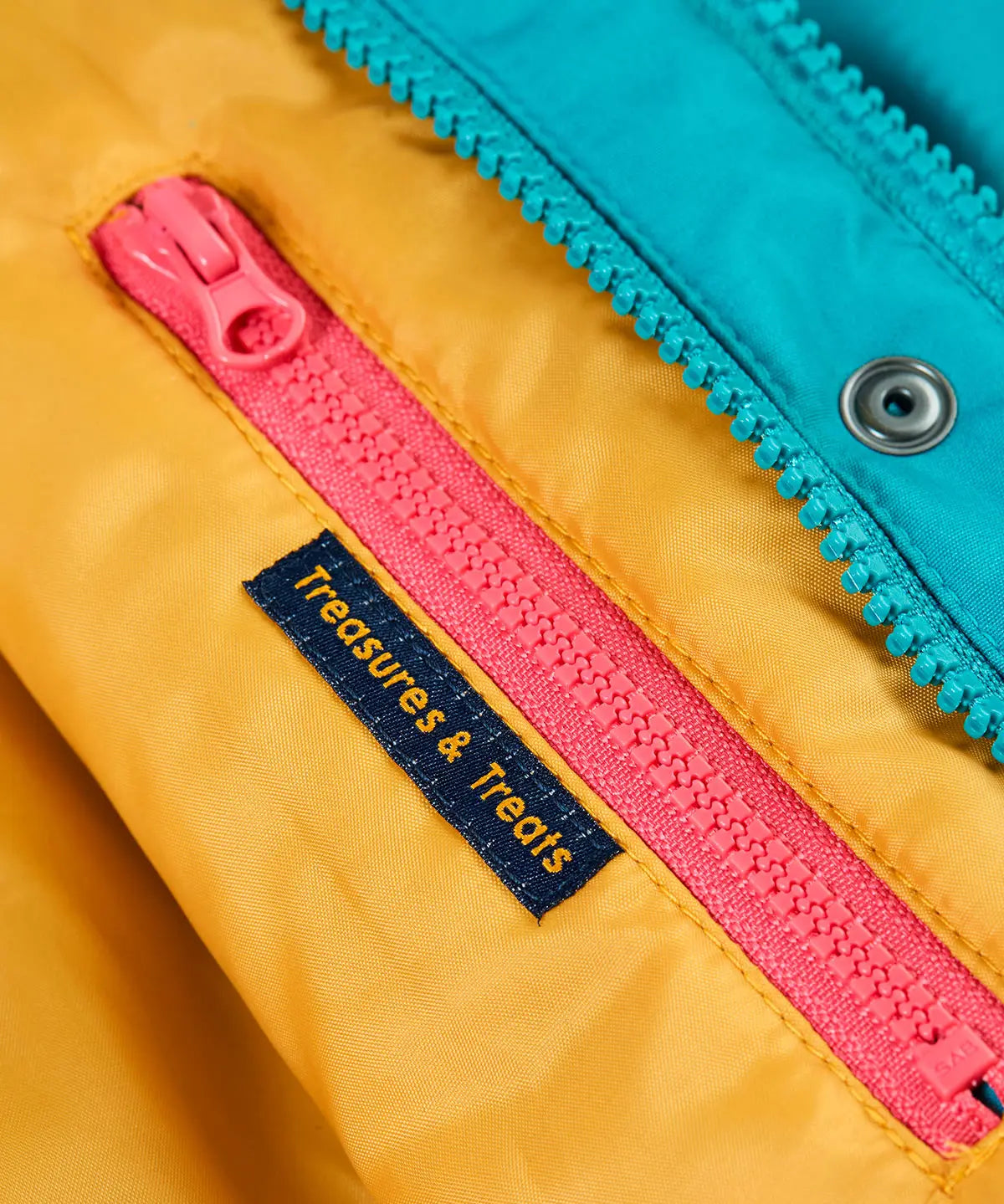 Frugi kids 3 in 1 rambler coat in boat blue/rhubarb check showing the inside zipped pocket detail